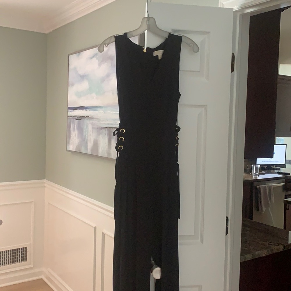 Michael Kors jumpsuit size small. Never worn